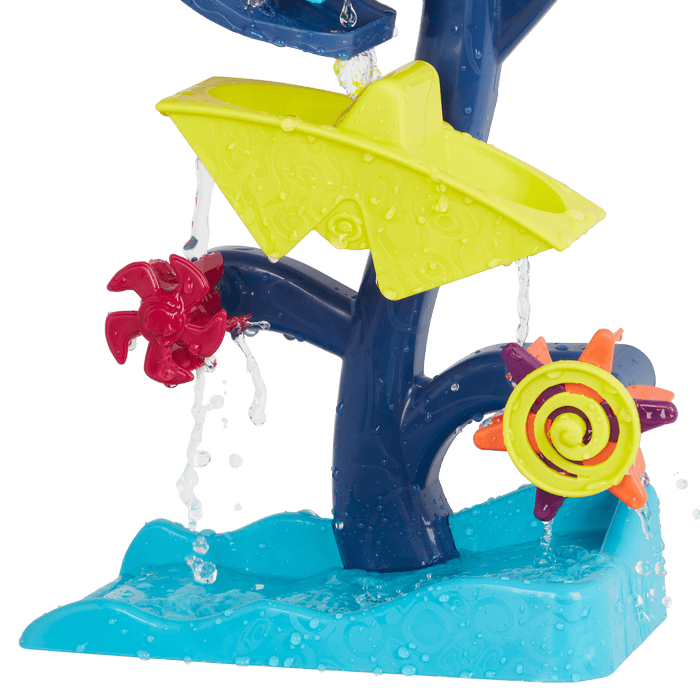 Water wheel toy with owl and truck.