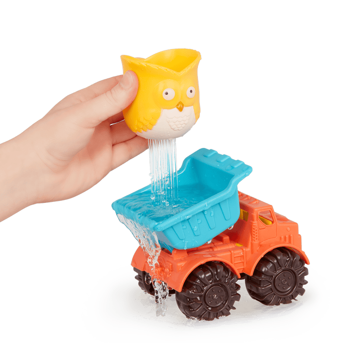 Water wheel toy with owl and truck.
