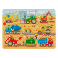 Peg puzzle with construction trucks.