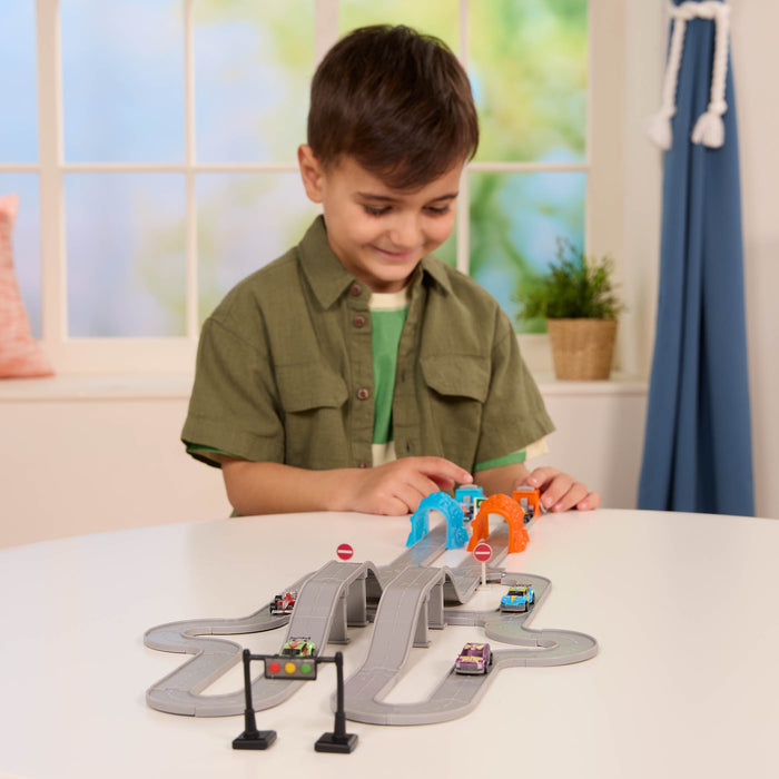 Toy car track with mini vehicles.