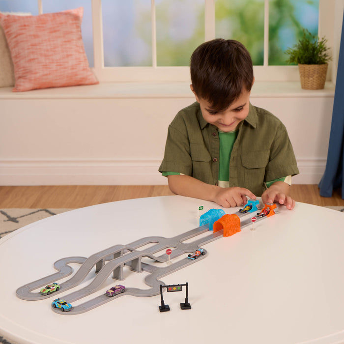 Toy car track with mini vehicles.