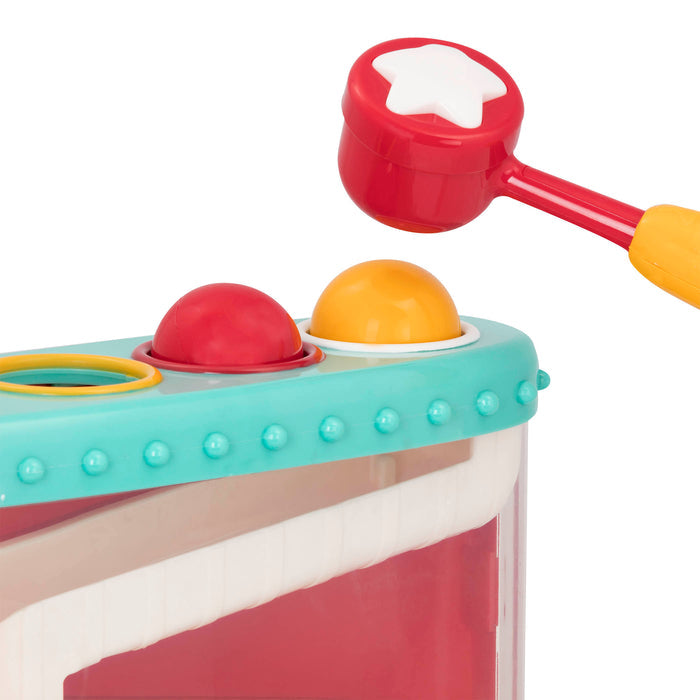 A toy for kids, pound the ball and watch it roll down it's chute.