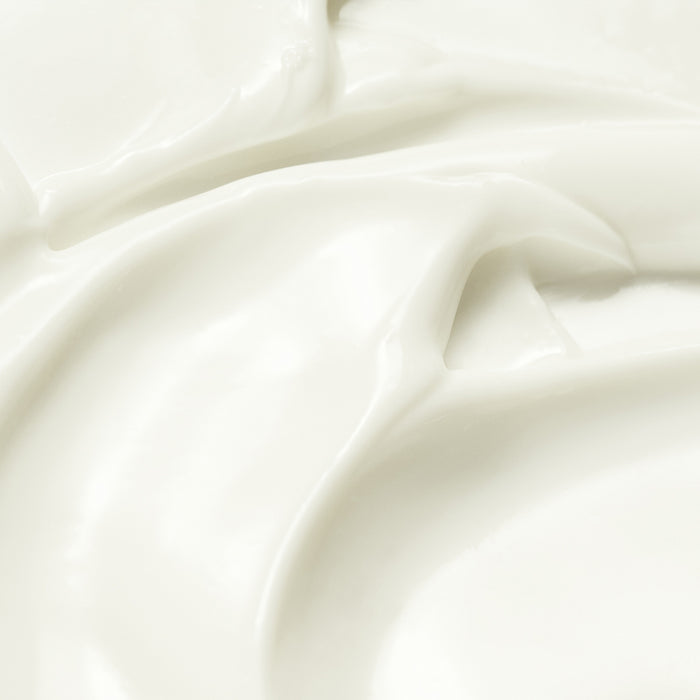 Close-up of white sun cream with folds