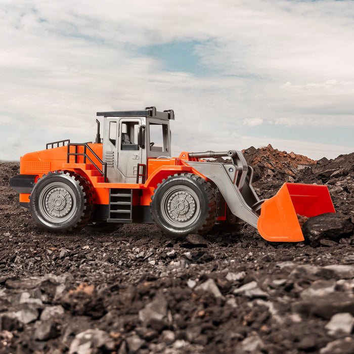 Midrange Remote control orange toy front end loader.