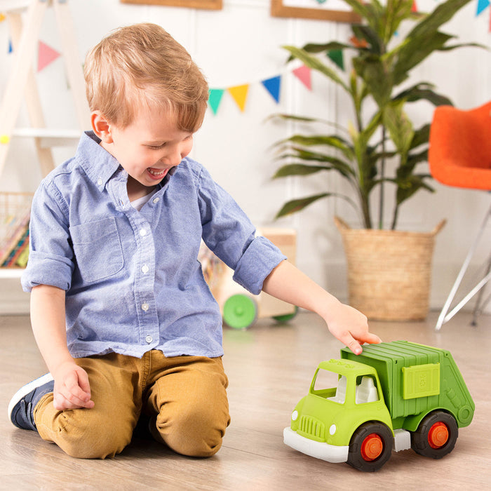 A toy recycling truck for kids and toddlers with movable parts — doors open for access to the compartments and the container tilts to empty recycling.