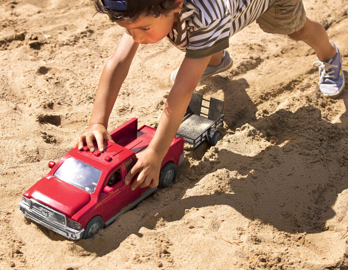 Midrange size red pick up truck