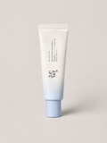A korean skincare SPF cream tube with a white to light blue gradient design, standing upright against a neutral light gray background. The tube features Beauty of Joseon Relief Sun Aqua-Fresh: Rice + B5. SPF 50+, 50 ml.