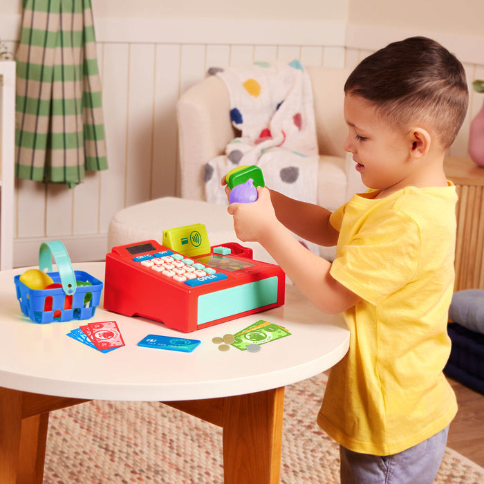 Toy cash register with accessories