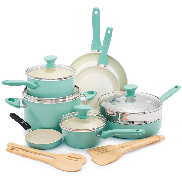 Turquoise ceramic cookware set with 16 pieces, including pots, pans, glass lids, and wooden utensils.