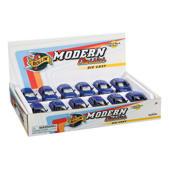 A display box labeled Rollin’ Audi SQ8 by Rollin’ holds twelve small blue die-cast Audi SQ8 replicas in three rows, featuring colorful branding, a choking hazard warning, and making an ideal addition to any car collection.