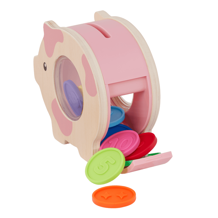 Piggy bank toy with colorful play coins and booklet.