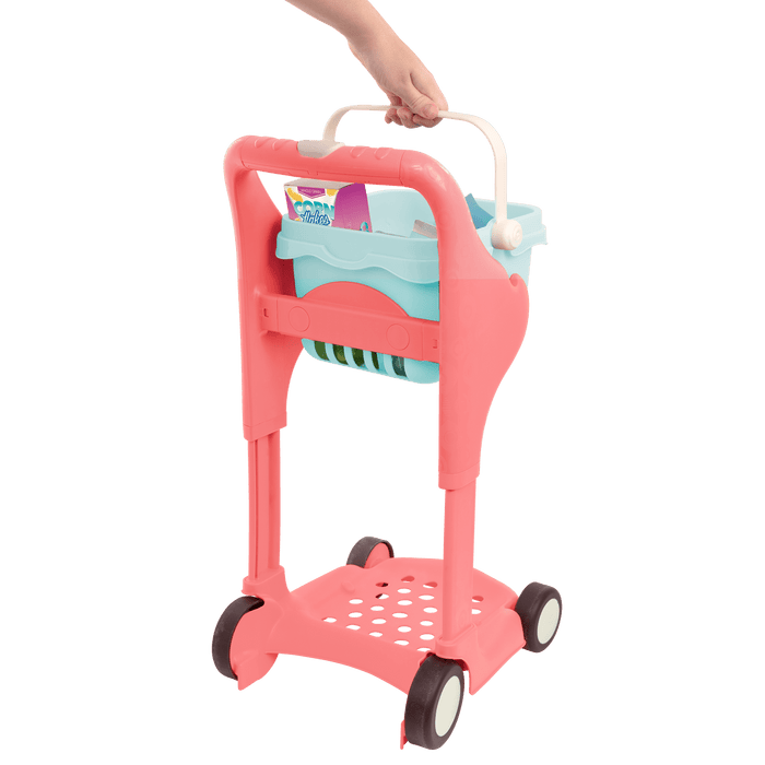 Toy shopping cart with groceries.