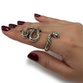 woman wearing the Silver Slithering Snake Wrap Ring with antique silver textured serpent design