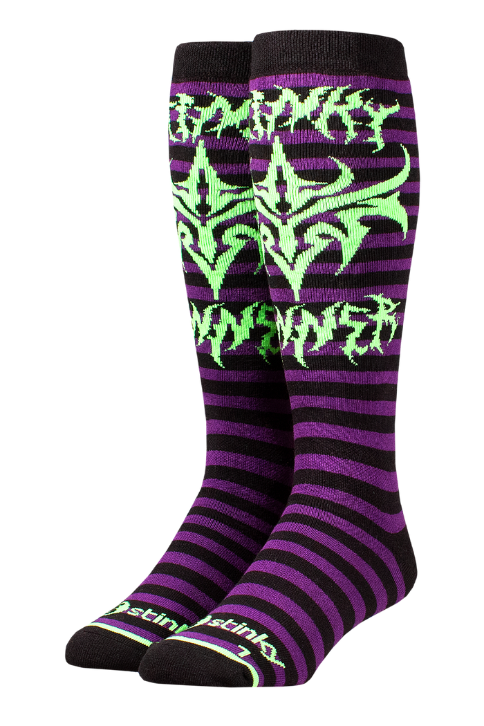 Purple and black striped socks with green tribal patterns on a white background