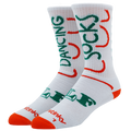 A pair of white crew socks with green and orange graphic text and lettering, displayed against a plain white background. Text sais Dancing Socks