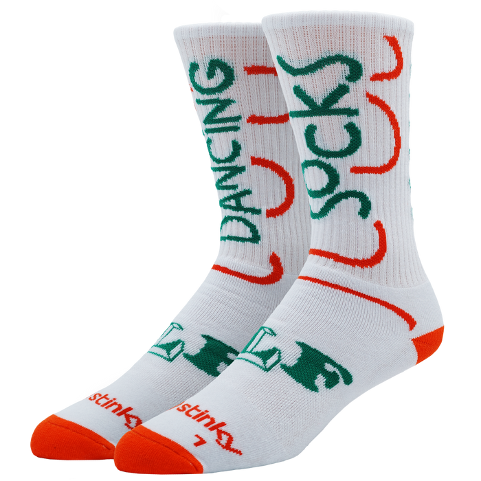 A pair of white crew socks with green and orange graphic text and lettering, displayed against a plain white background. Text sais Dancing Socks