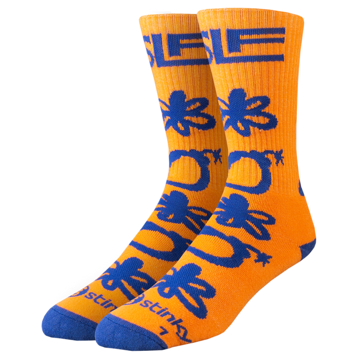 Orange socks with blue designs and text on a white background