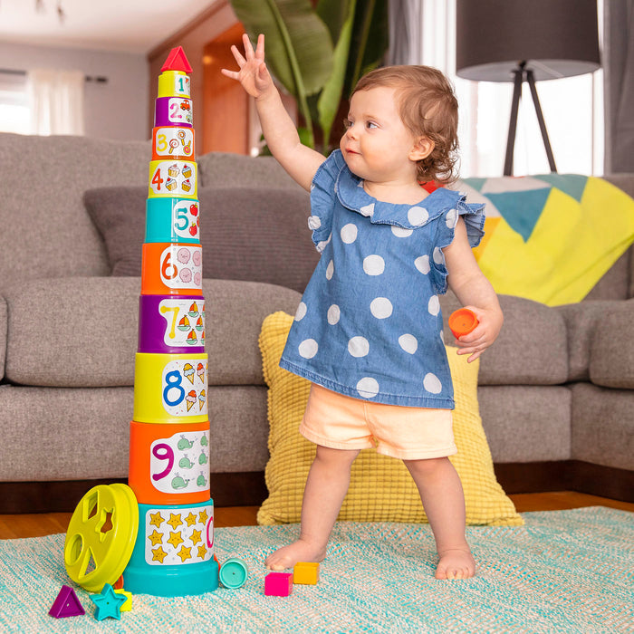 Stacking buckets for toddler with shapes to sort.