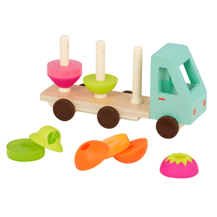 Toy truck with stackable fruits.