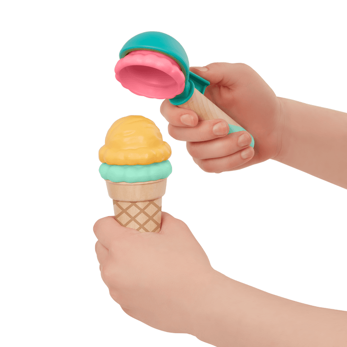 Toy ice cream truck with scoops.