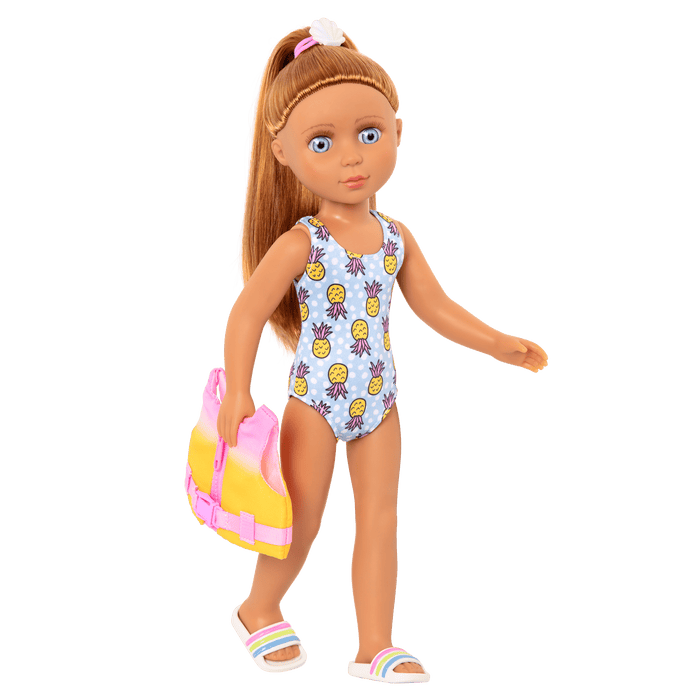 14-inch posable doll with light brown hair and blue eyes holding paddleboard