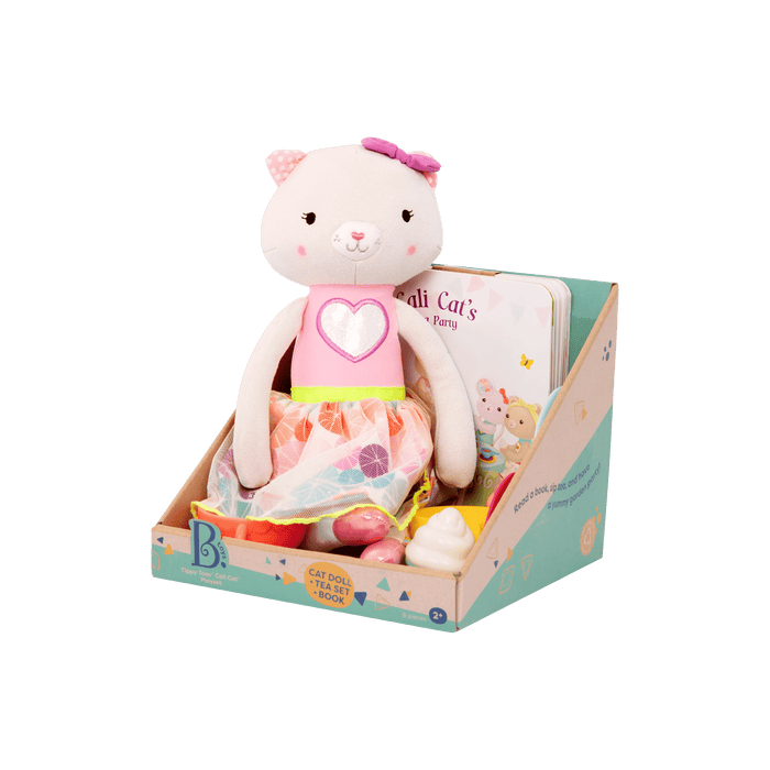 Tea set with plush cat and book.