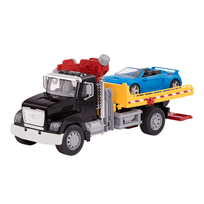 Black toy tow truck towing blue car