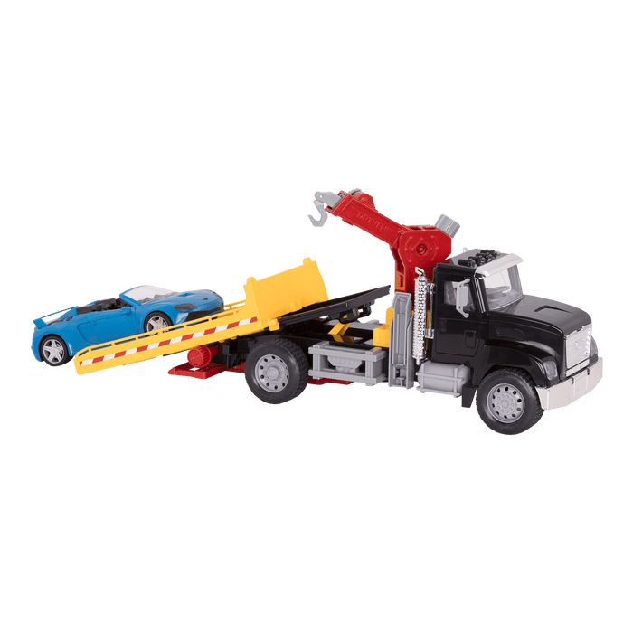 Black toy tow truck towing blue car