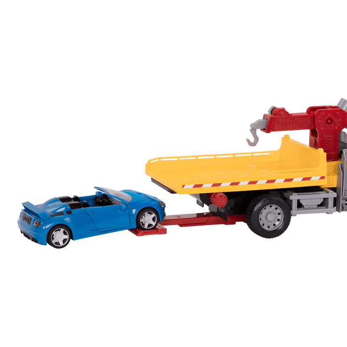 Black toy tow truck towing blue car