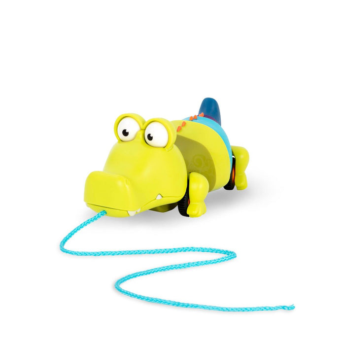 Pull-along crocodile toy.
